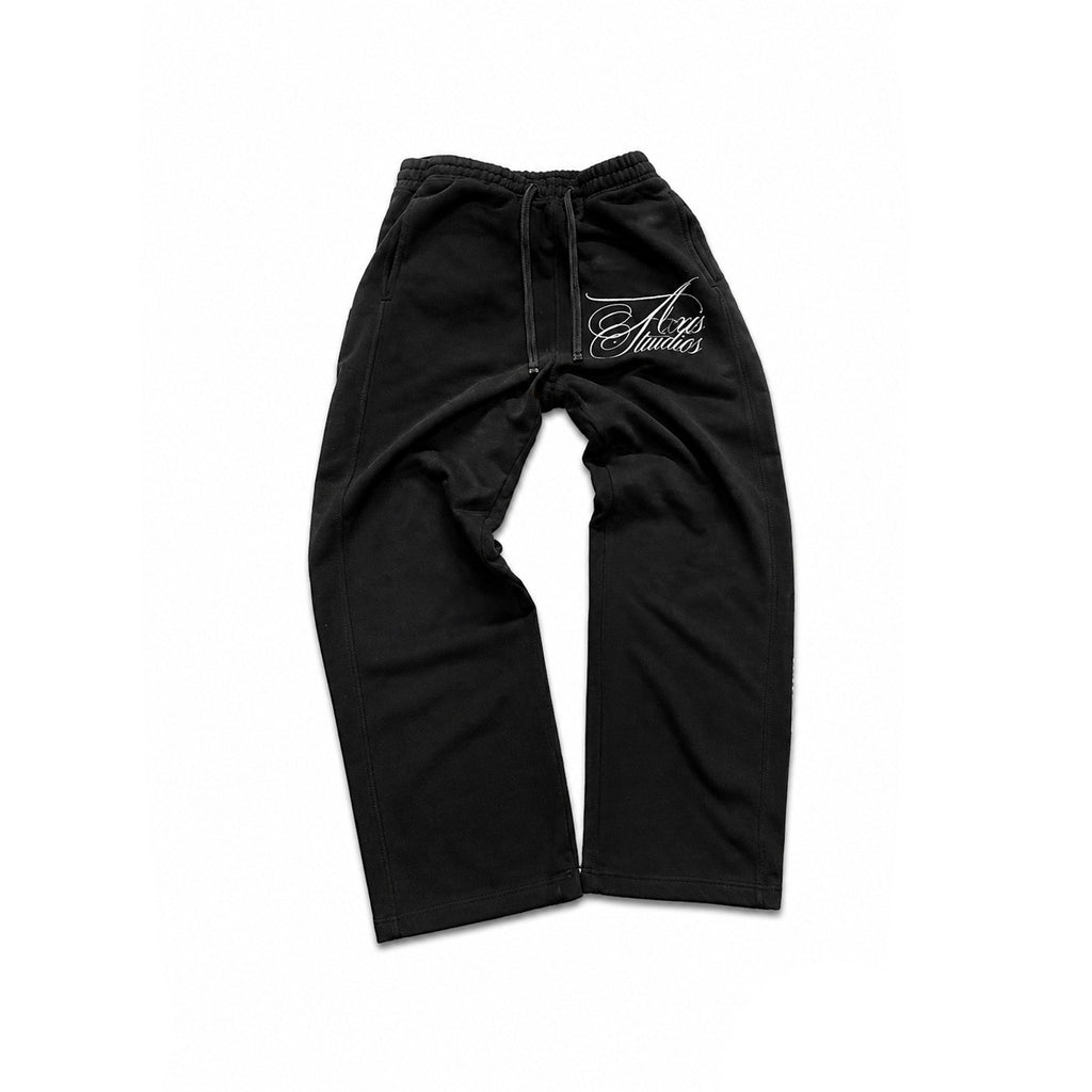Black sweatpants with a white script logo on the upper left thigh, displayed flat against a white background with black letterboxing on the sides.