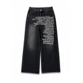 Black wide-leg denim jeans with white printed text on the front, shown flat against a white background with black side bars. The brand name 'AXIS' is visible in the bottom right corner.