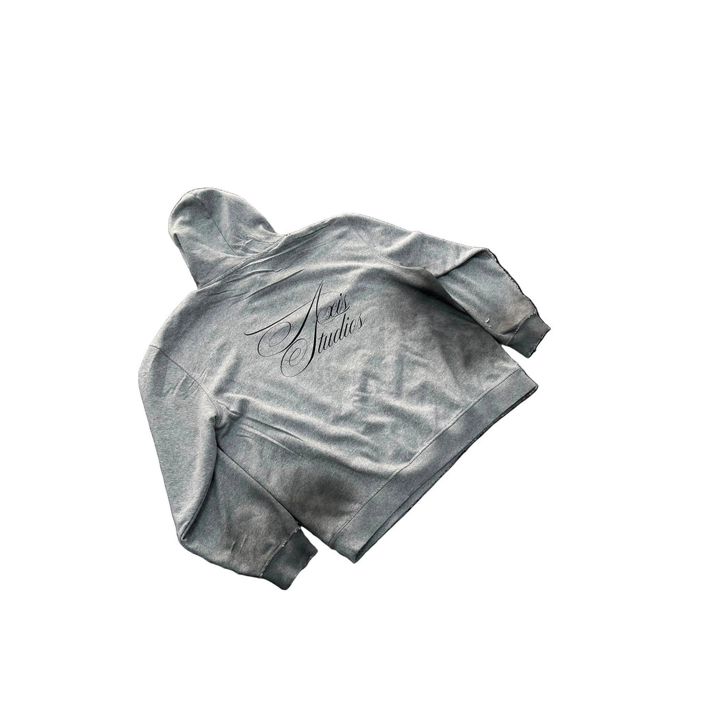 A gray cropped hoodie with a black cursive 'Art Studios' logo printed on the back, shown against a plain white background.