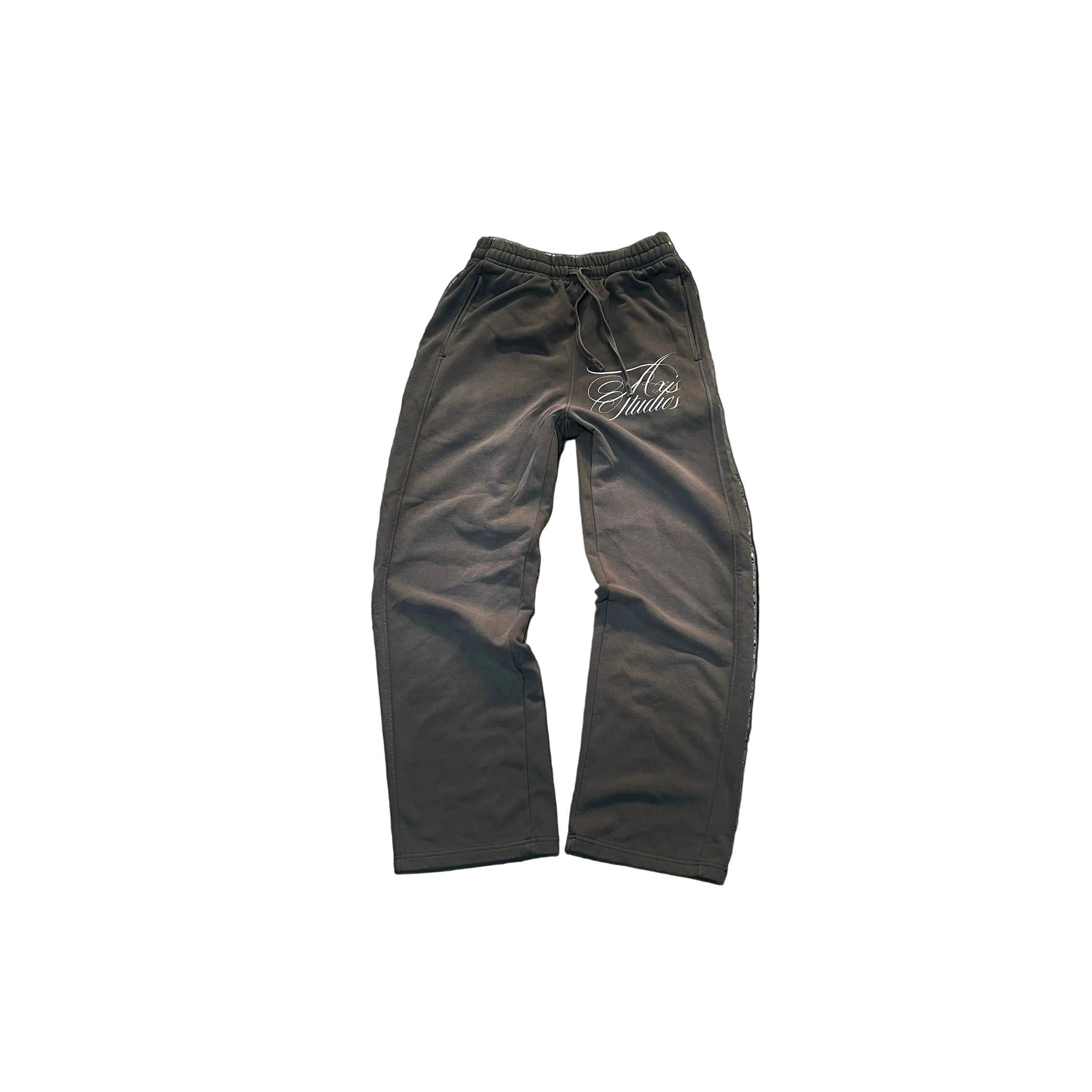 A pair of dark brown drawstring sweatpants with a white script logo on the upper left leg, displayed flat against a white background with black letterbox bars on the sides.