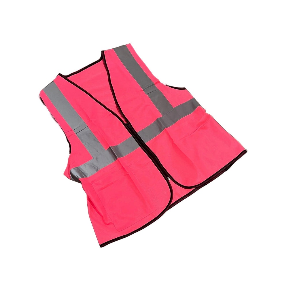 A high-visibility safety vest in bright pink with reflective silver-gray stripes and black trim, shown on a plain white background.