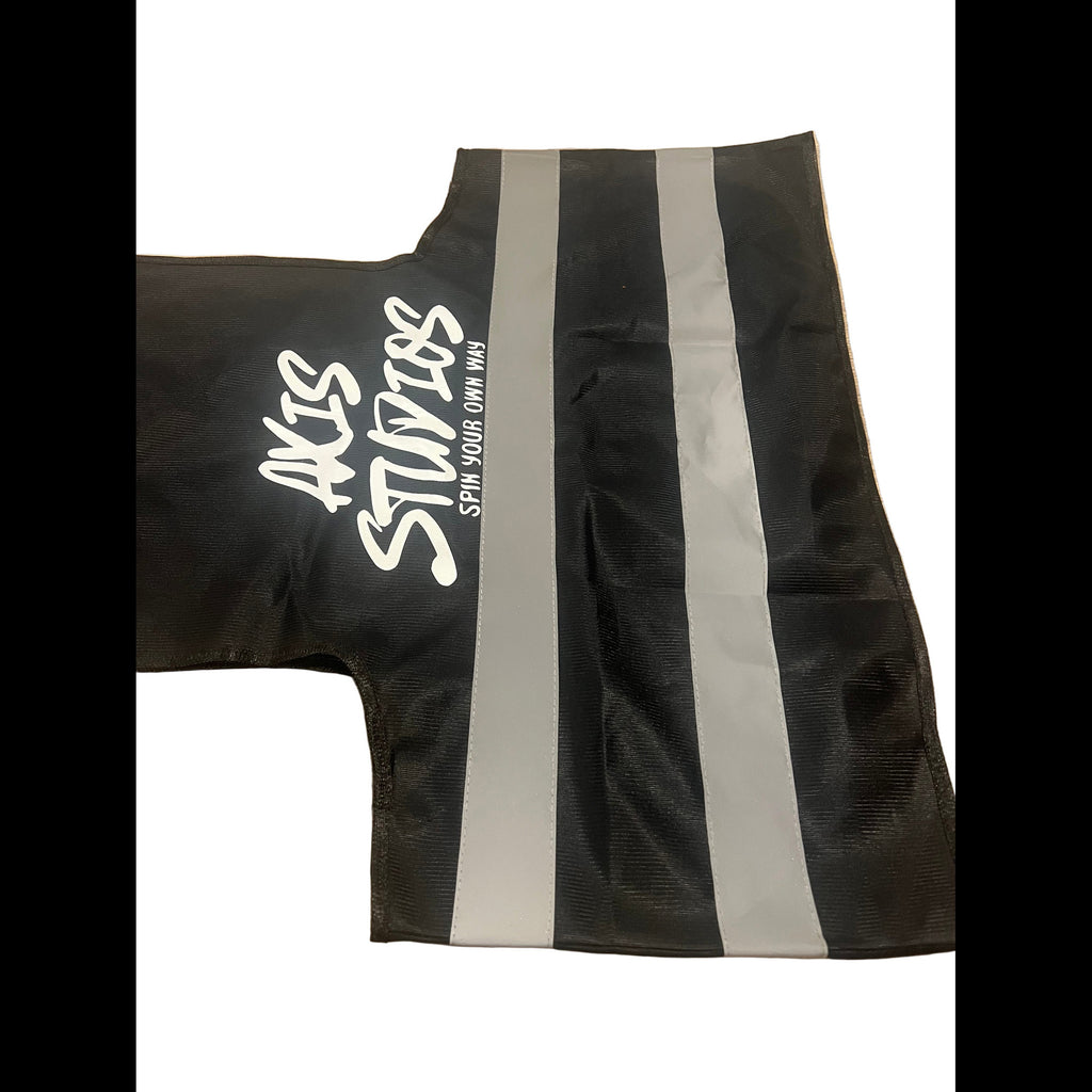 Black athletic shorts with two vertical silver reflective stripes and white 'AKIS STANZIS' branding on the left leg, shown flat against a white background.