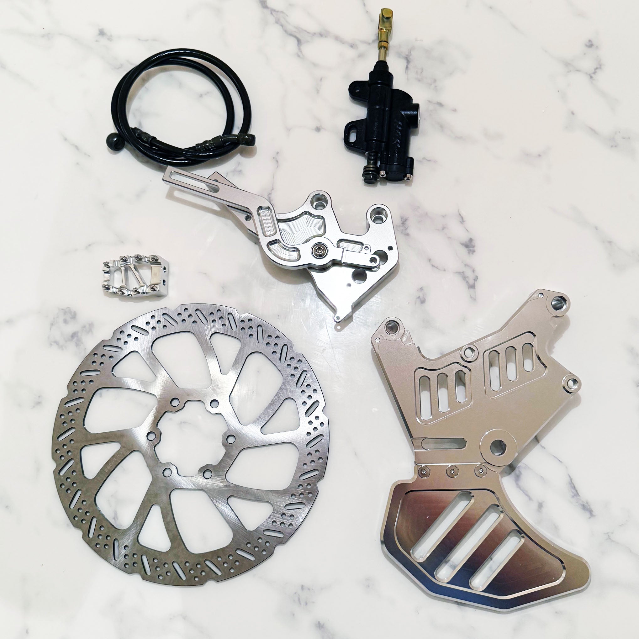 Foot brake kit for Sur-Ron LBX and E-Ride with Ultra Bee caliper – close-up detail