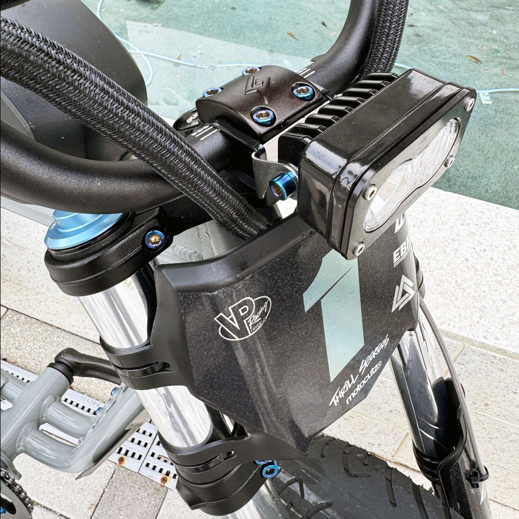 Super73 RX titanium triple clamp bolt set – close-up detail