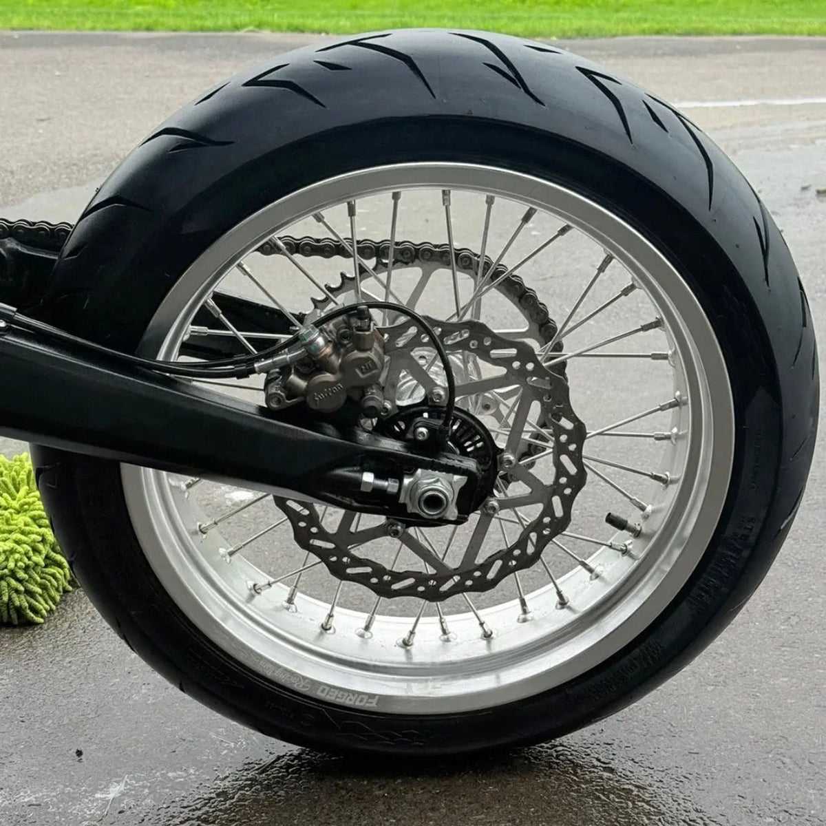 Sur-Ron Ultra Bee 17-inch supermoto wheel set in black and chrome finish – different angle