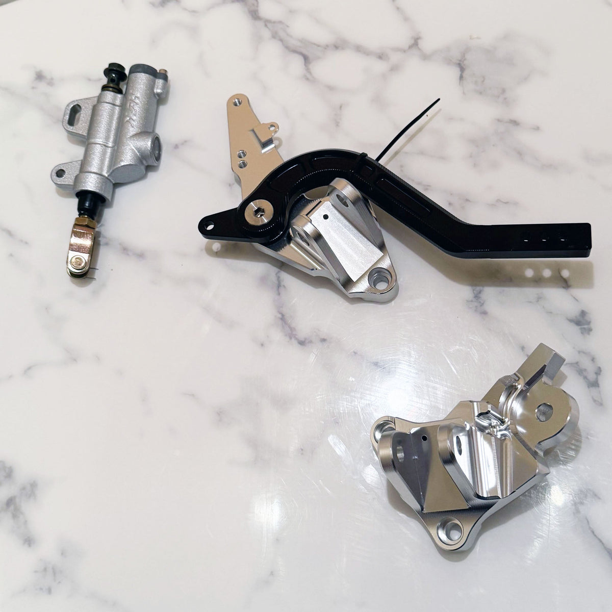 Sur-Ron Ultra Bee footbrake kit V3 with dual caliper option – close-up detail