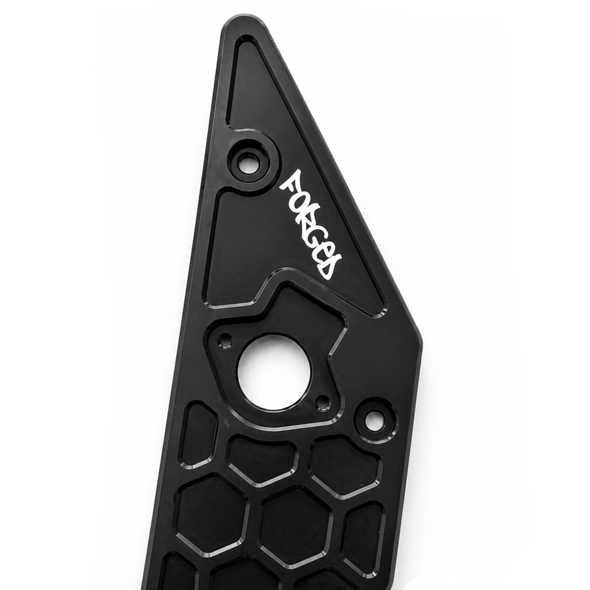 A black anodized aluminum engine component, likely a camshaft sprocket cover or timing cover, featuring a honeycomb pattern, a central circular hole, and the brand name 'FORGED' in white on the side.