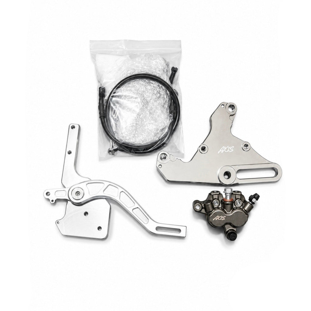 A set of motorcycle or bicycle mechanical parts on a white background, including a silver metal lever, a silver bracket marked 'AOS', a dark metallic caliper with 'AOS' branding, a black cable in a clear plastic bag, and a black AXIS logo watermark in the bottom right corner.